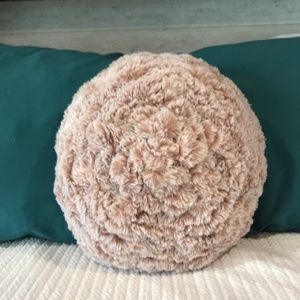 Round blush fuzzy pillow!